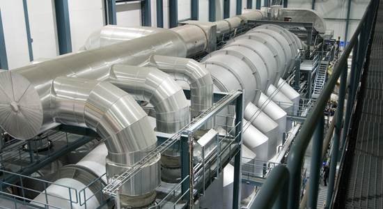 Pellets being extruded from a die